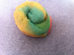 Rainbow biscuits rolled into a snail