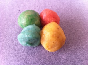 Rainbow biscuits rolled into balls