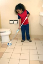 Child Cleaning Bathroom